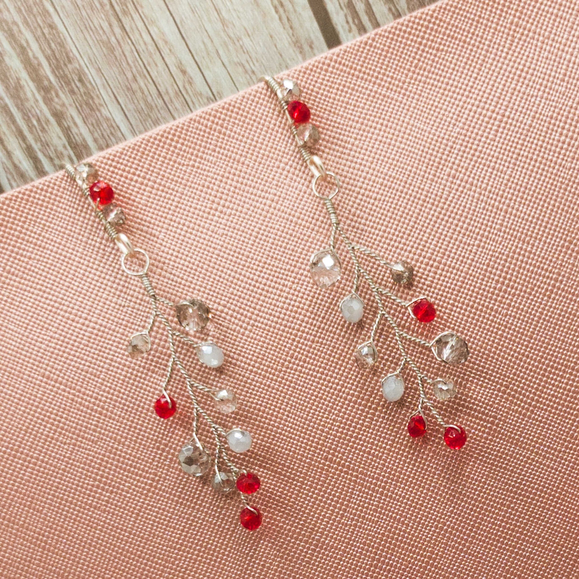 tocado ema-Plateado con rojo