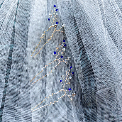 tocado ema-Plateado con azul