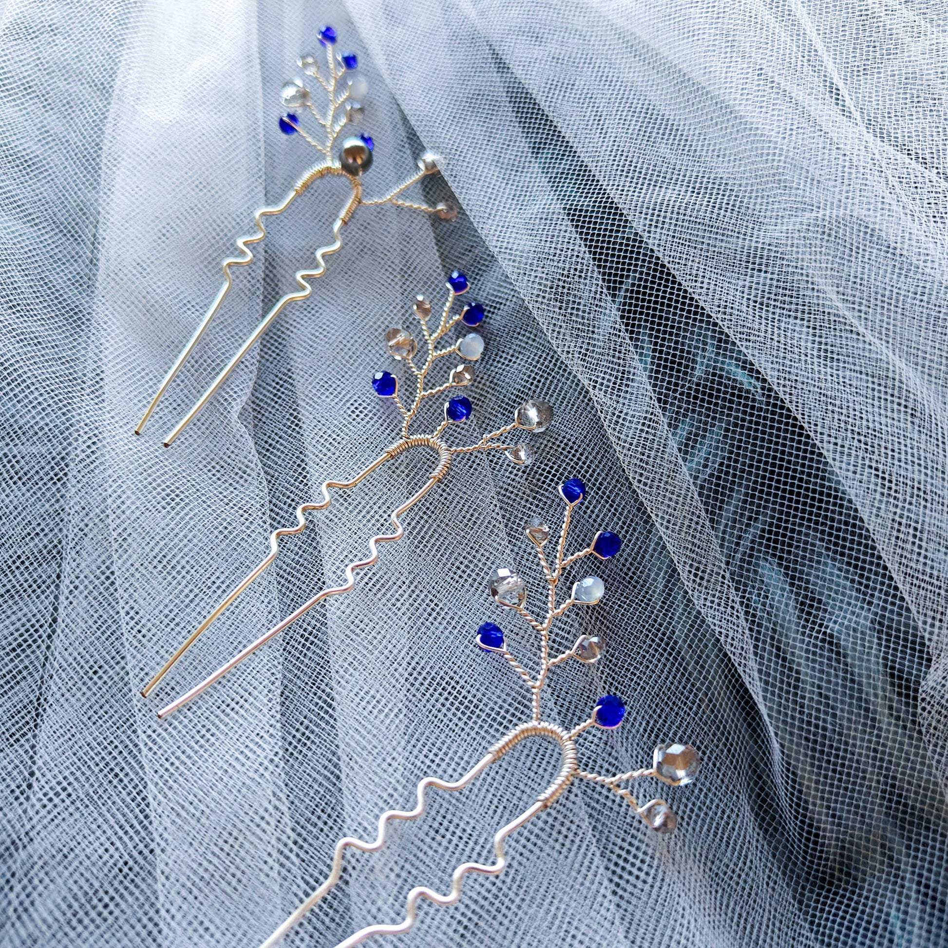 tocado ema-Plateado con azul