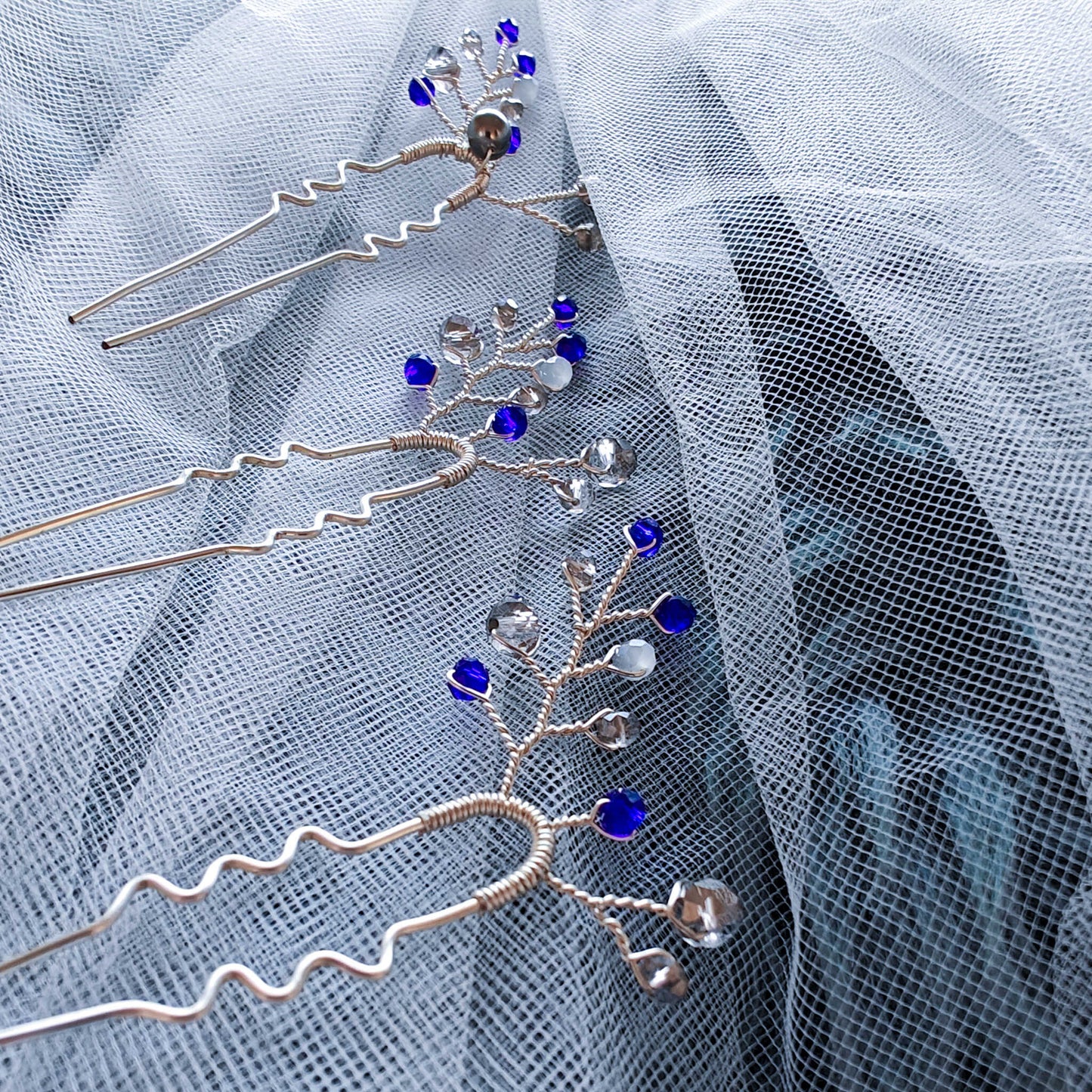 tocado ema-Plateado con azul