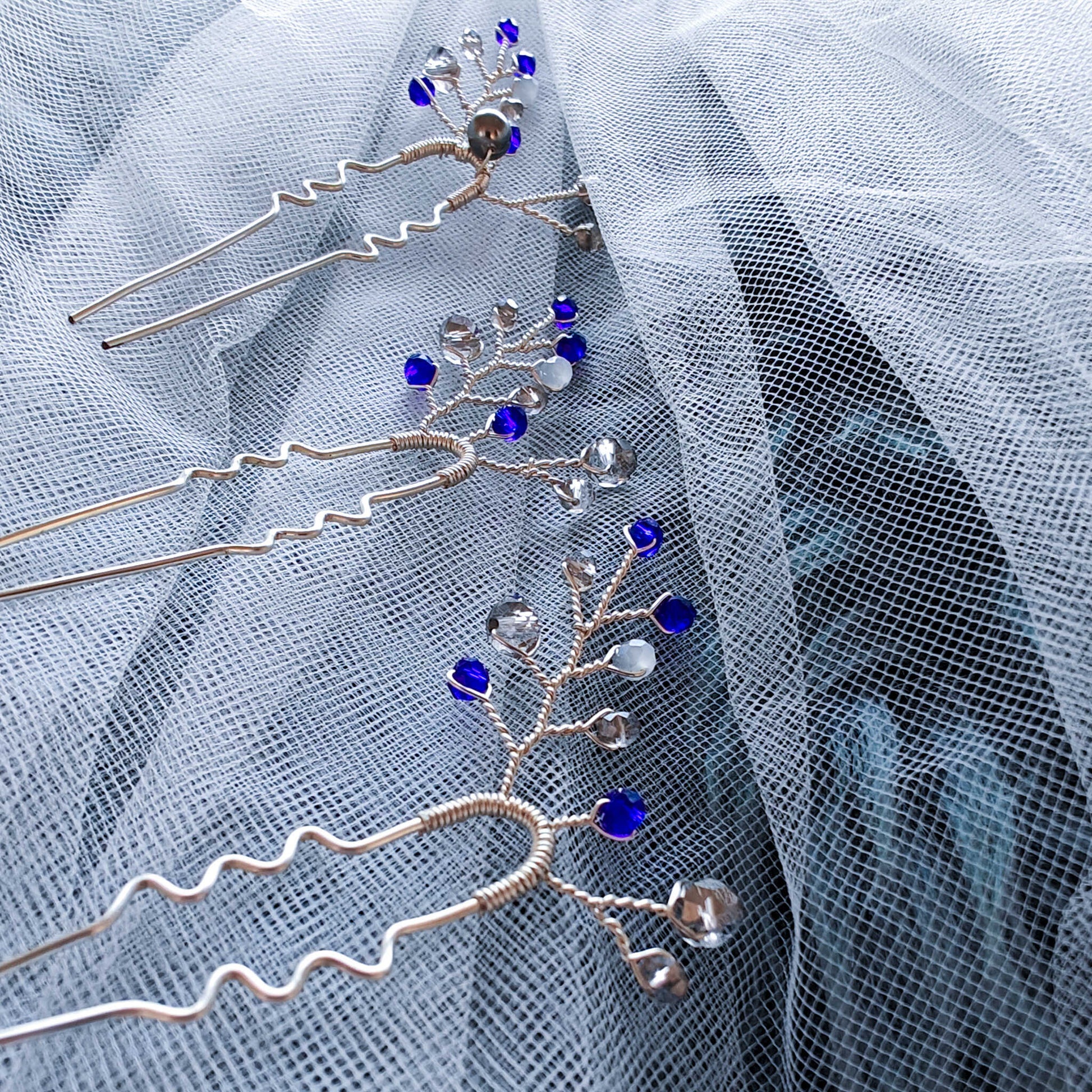 tocado ema-Plateado con azul