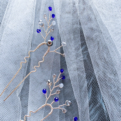 tocado ema-Plateado con azul