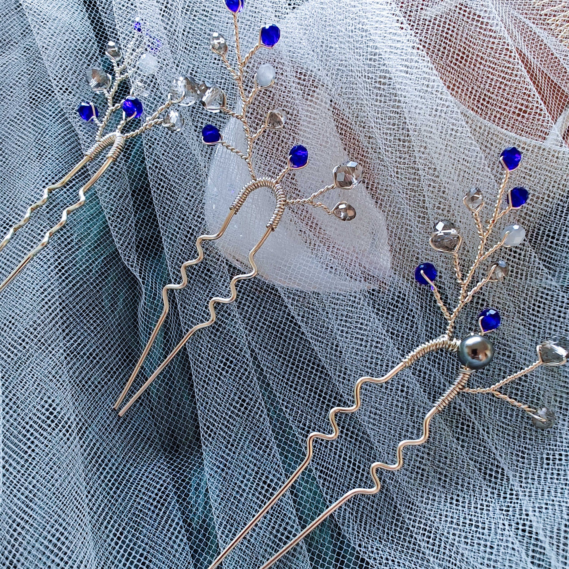 tocado ema-Plateado con azul